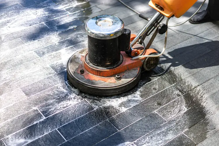 photo of a man cleaning a new build office